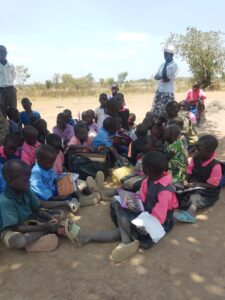 Distribution of Scholastic materials to community Schools in Otuke 